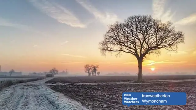 Frosty landscape, with low sun over the horizon