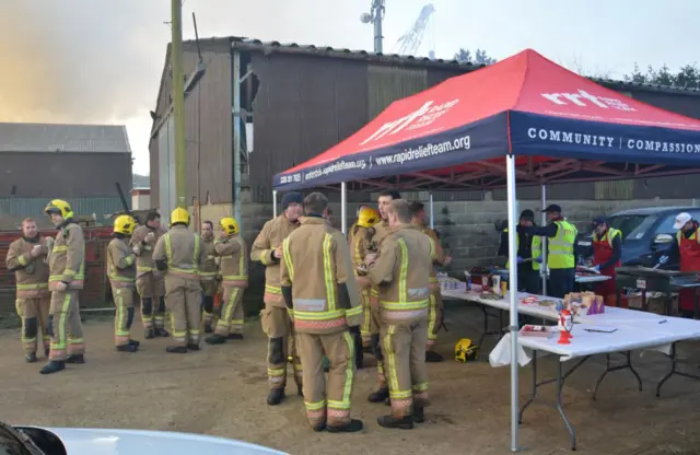 Fire crews on Sunday morning getting refreshments