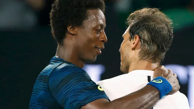 Rafael Nadal consoles Gael Monfils