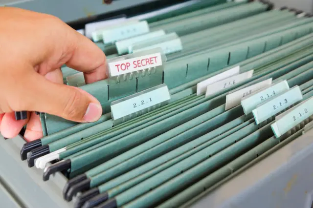 A drawer of top secret documents