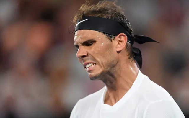 Rafael Nadal reacts