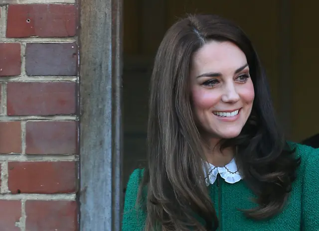 The Duchess of Cambridge, smiling, at the EACH centre