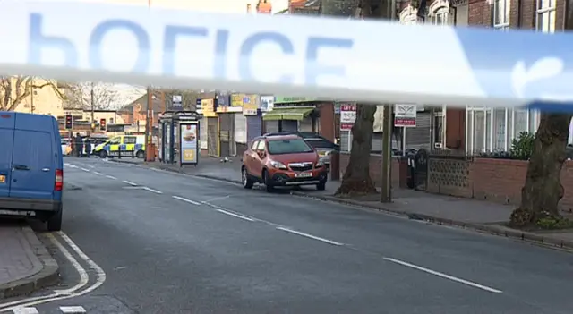 Police cordon showing a bus stop