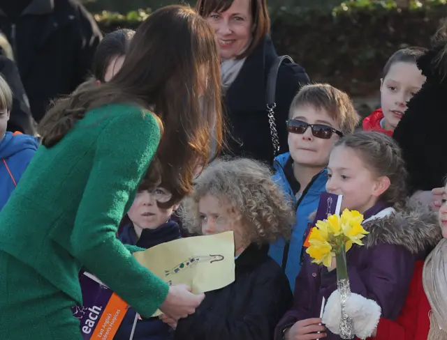 The Duchess holding a picture