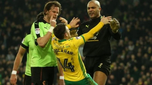 Carl Ikeme pushed Norwich's Wes Hoolan in the chest, making him lose his balance