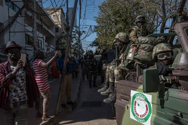 ECOWAS (Economic Community of Western Africa States) troops from Senegal move towards the Gambian statehouse on January 23, 2017 in Banjul, The Gambia.