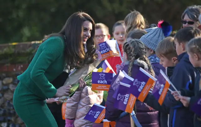 The Duchess of Cambridge talking to children