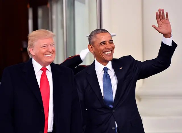 President Barak Obama (R) and President-elect Donald Trump smile at the White House before the inauguration on January 20, 2017 in Washington, D.C.