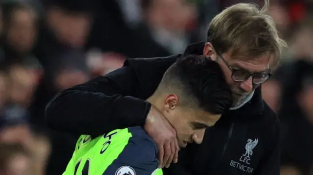 Philippe Coutinho and Jurgen Klopp