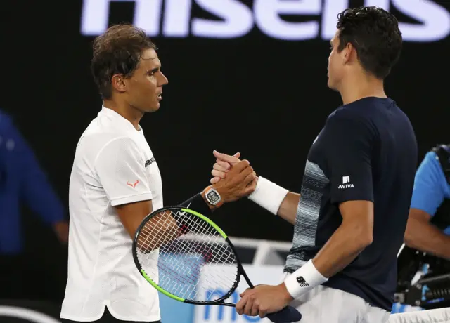 Nadal and Raonic shake hands