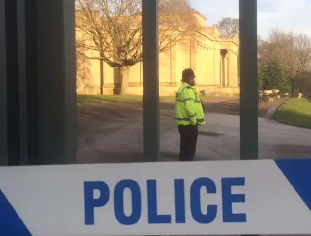 Police cordon on park gates