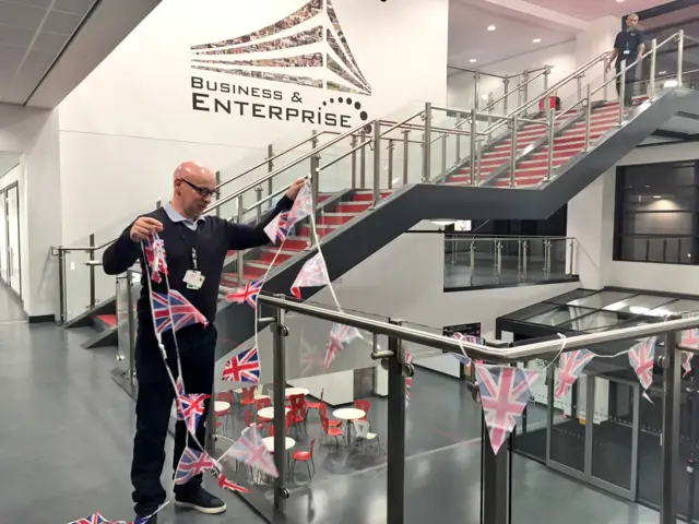 Bunting going up in Leicester College