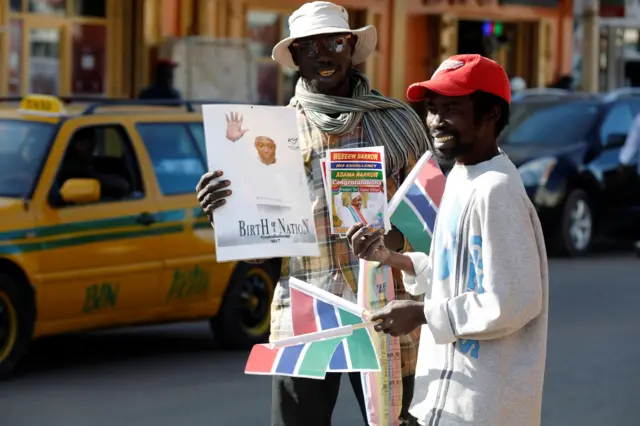 Serekunda people selling flags