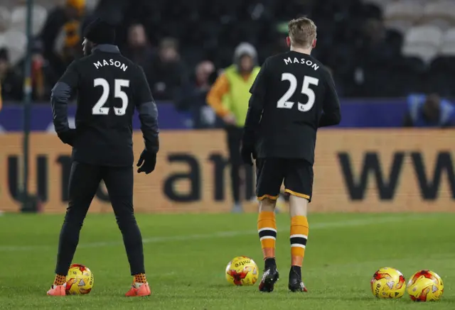 Hull players wearing shirts in support of Ryan Mason