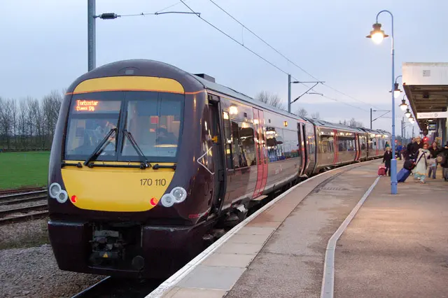 A train awaits departure from Ely rail station