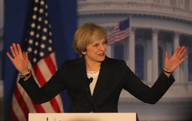 Theresa May speaks in the US