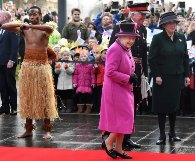 Crowd welcomes the Queen