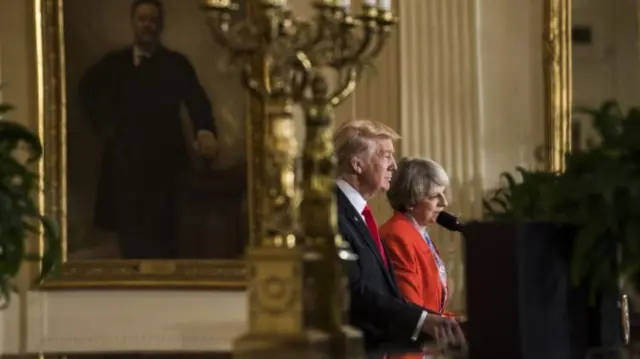 Donald Trump and Theresa May speak at a White House press conference