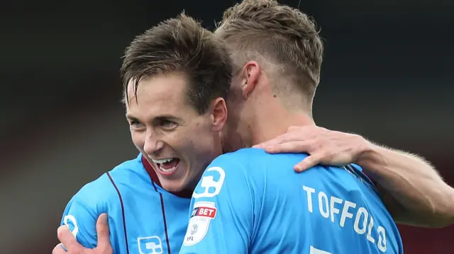 Josh Morris and Harry Toffolo celebrate a goal