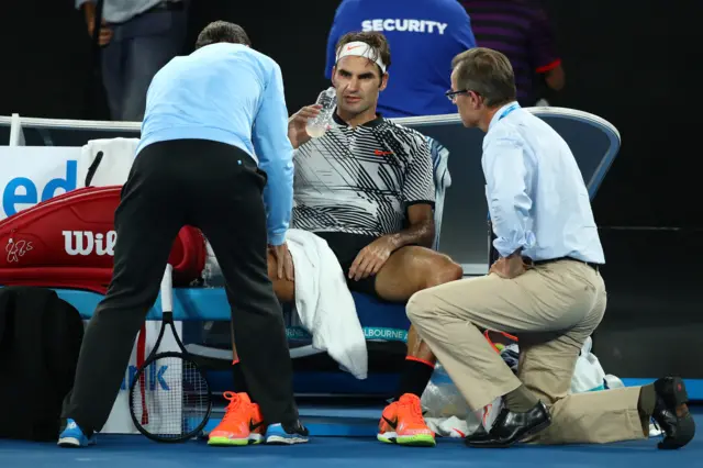 Federer receives medical treatment