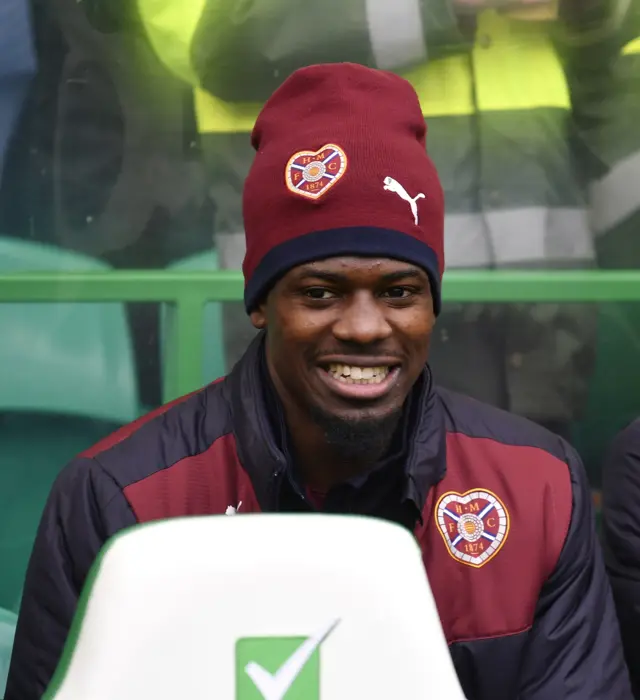 New signing Dylan Bikey is all smiles on the Hearts bench