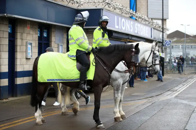 police at The Den