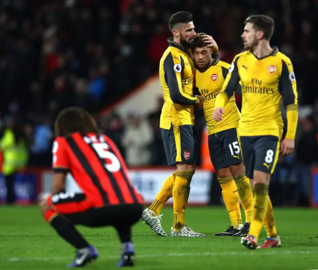 Arsenal players celebrate at full-time