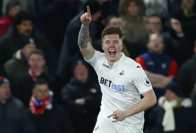 Alfie Mawson celebrates