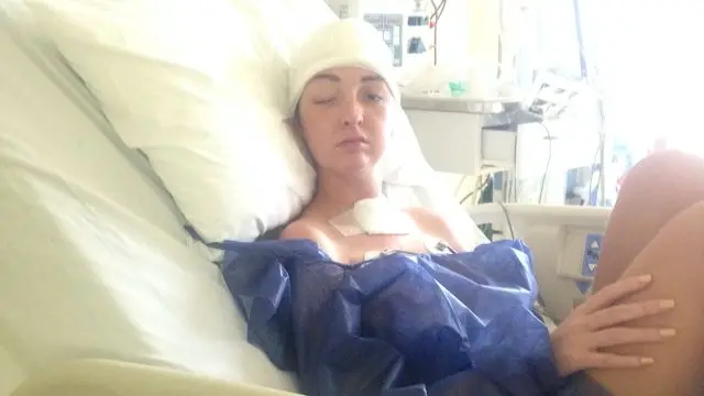 Laurie in hospital bed