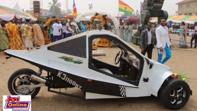 A three-wheel motorcycle on display.