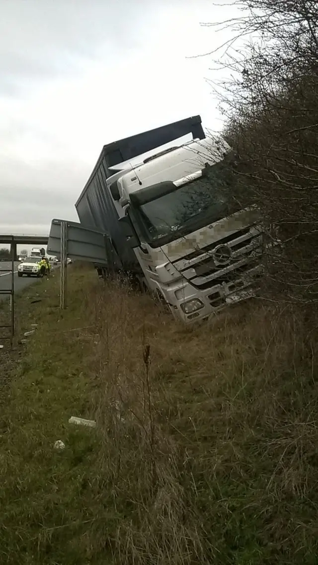 Lorry in hedge