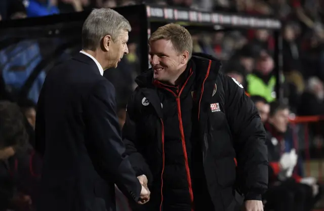 Arsene Wenger and Eddie Howe shake hands