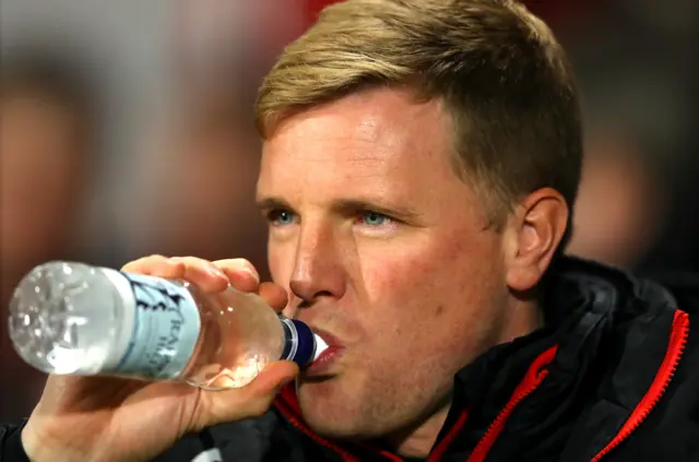 Eddie Howe drinks during the match