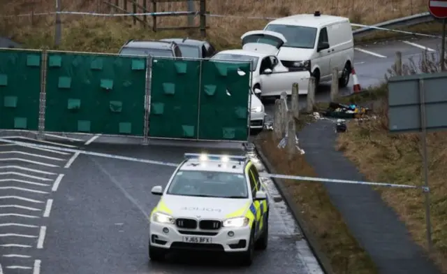 Police forensic teams at AInley Top