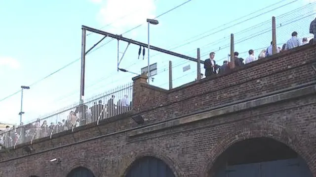 Rail tunnel and passengers