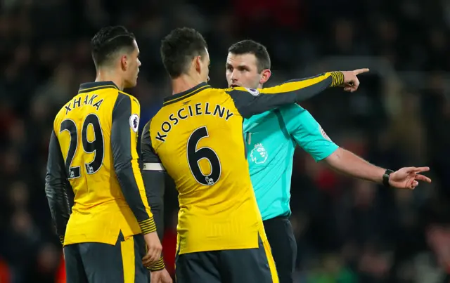 Referee Michael Oliver awards a penalty