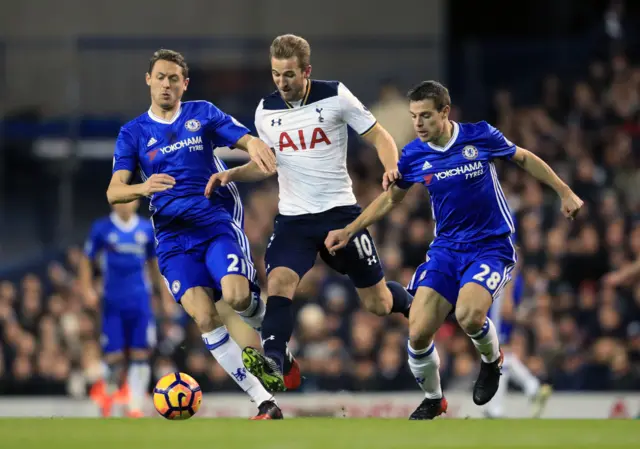 Nemanja Matic and Cesar Azpilicueta vie with Harry Kane