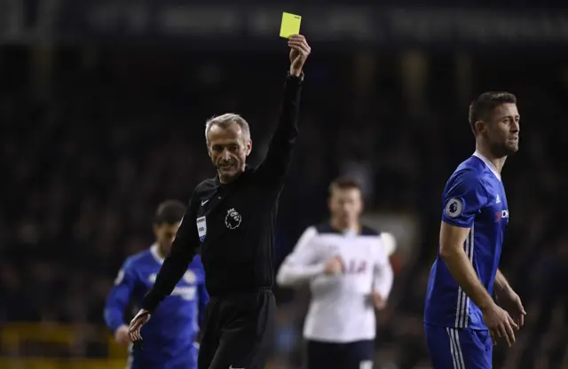 Gary Cahill is shown a yellow card