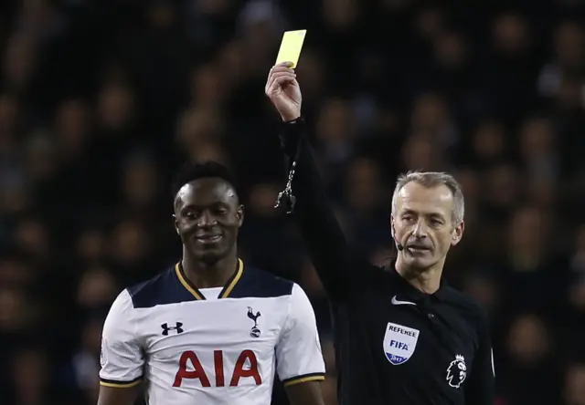 Victor Wanyama is shown a yellow card