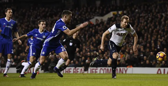 Harry Kane runs for the ball