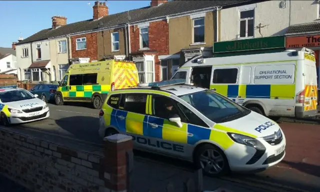 Police cars and ambulance in Henegage Road in Grimsby