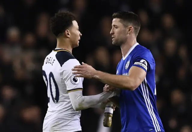 Gary Cahill shakes hands with Dele Alli