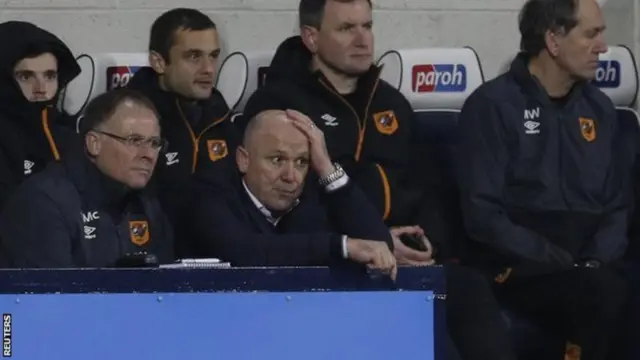 Mike Phelan watching a football match