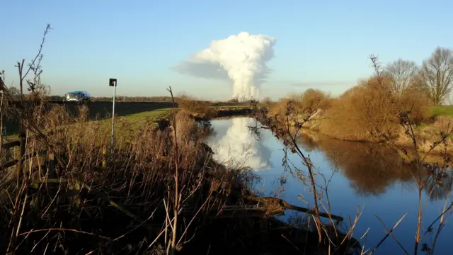 Drax Power station reflecting in River Don