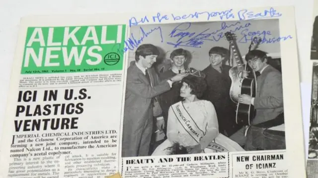 John Lennon signed newspaper