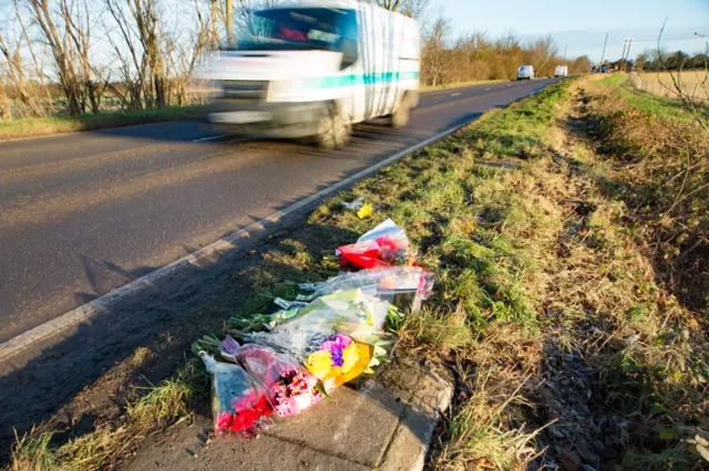 Floral tributes by the side of the road