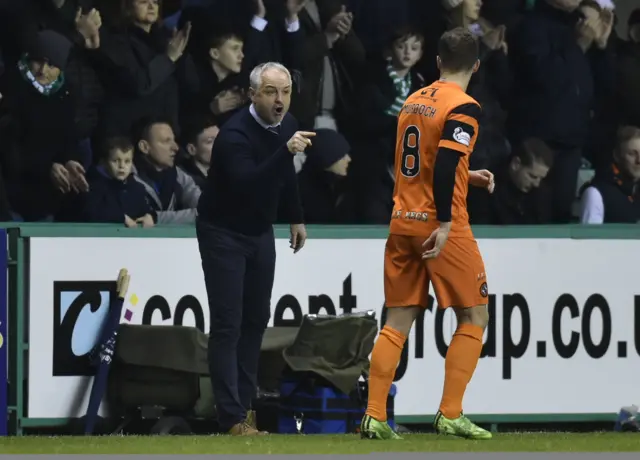 United manager Ray McKinnon barks commands at Stewart Murdoch