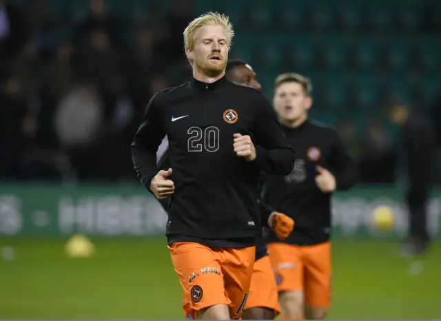 United striker Thomas Mikkelsen warms up