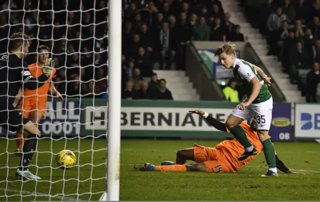 Jason Cummings scores his second goal for Hibs against Dundee United