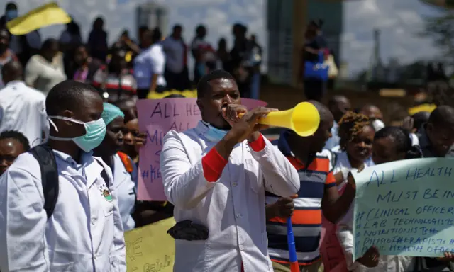 Kenyan nurses and other health-workers demonstrate